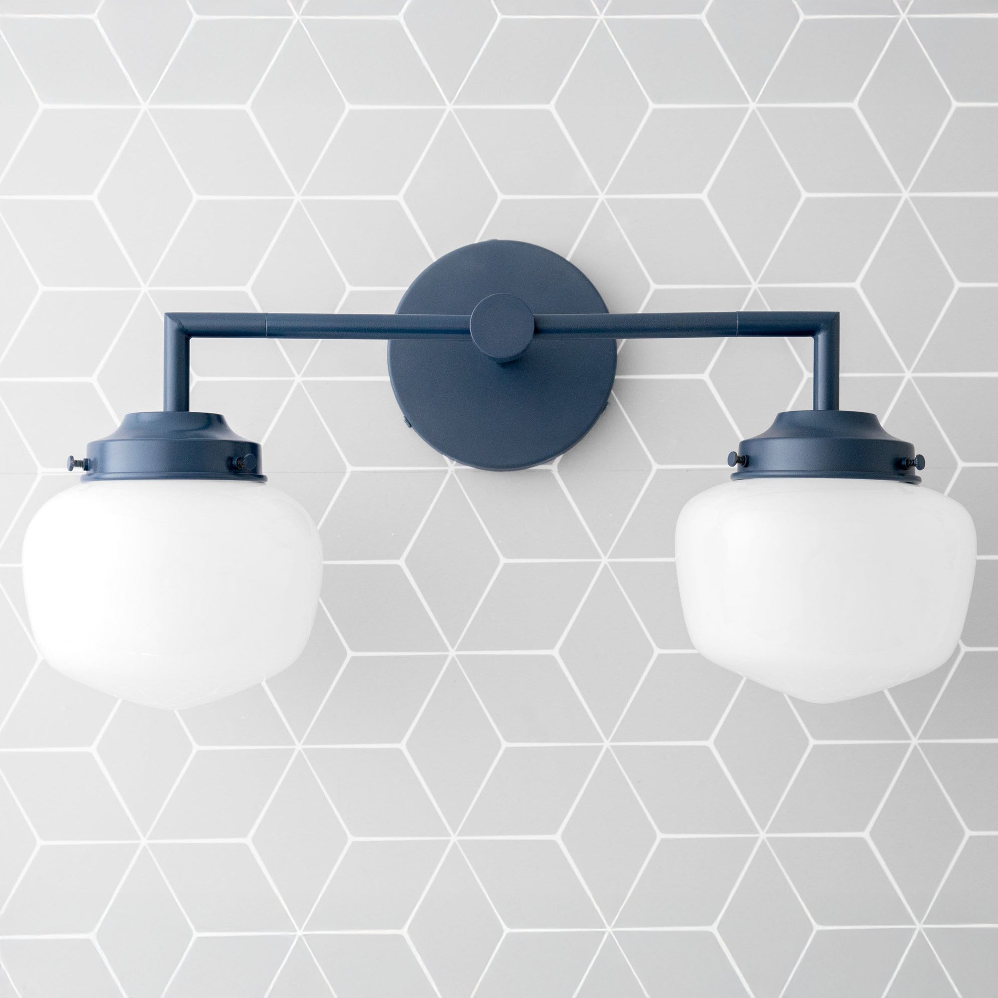 Art Deco style vanity light in coal blue with two round white glass globes and metal wall mount. - VANITY LIGHT MODEL NO. 0276