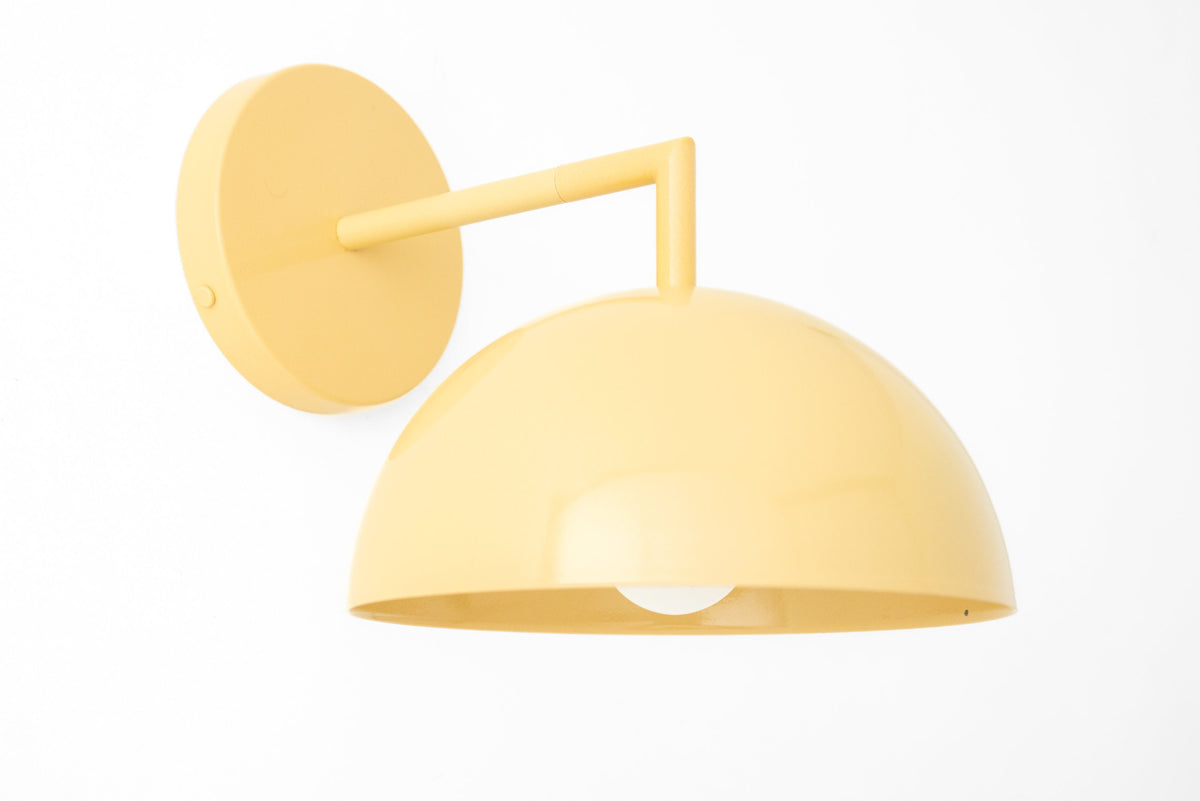 Yellow dome-shaped Scandinavian wall sconce with matte finish and round wall mount. - SCONCE MODEL NO. 6952