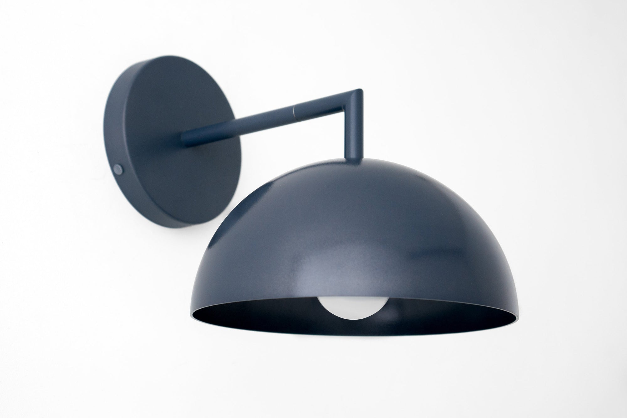 Matte coal blue dome-shaped wall sconce with round backplate and exposed bulb. - SCONCE MODEL NO. 6952