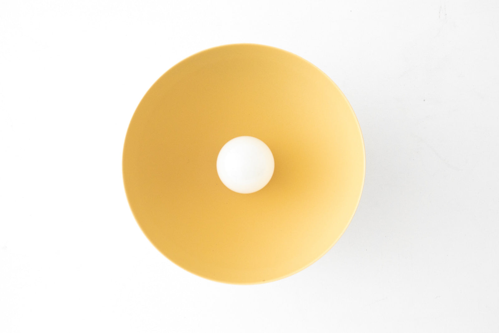 Flush mount ceiling light with smooth yellow dome shade and central bulb opening. - CEILING LIGHT MODEL NO. 9105