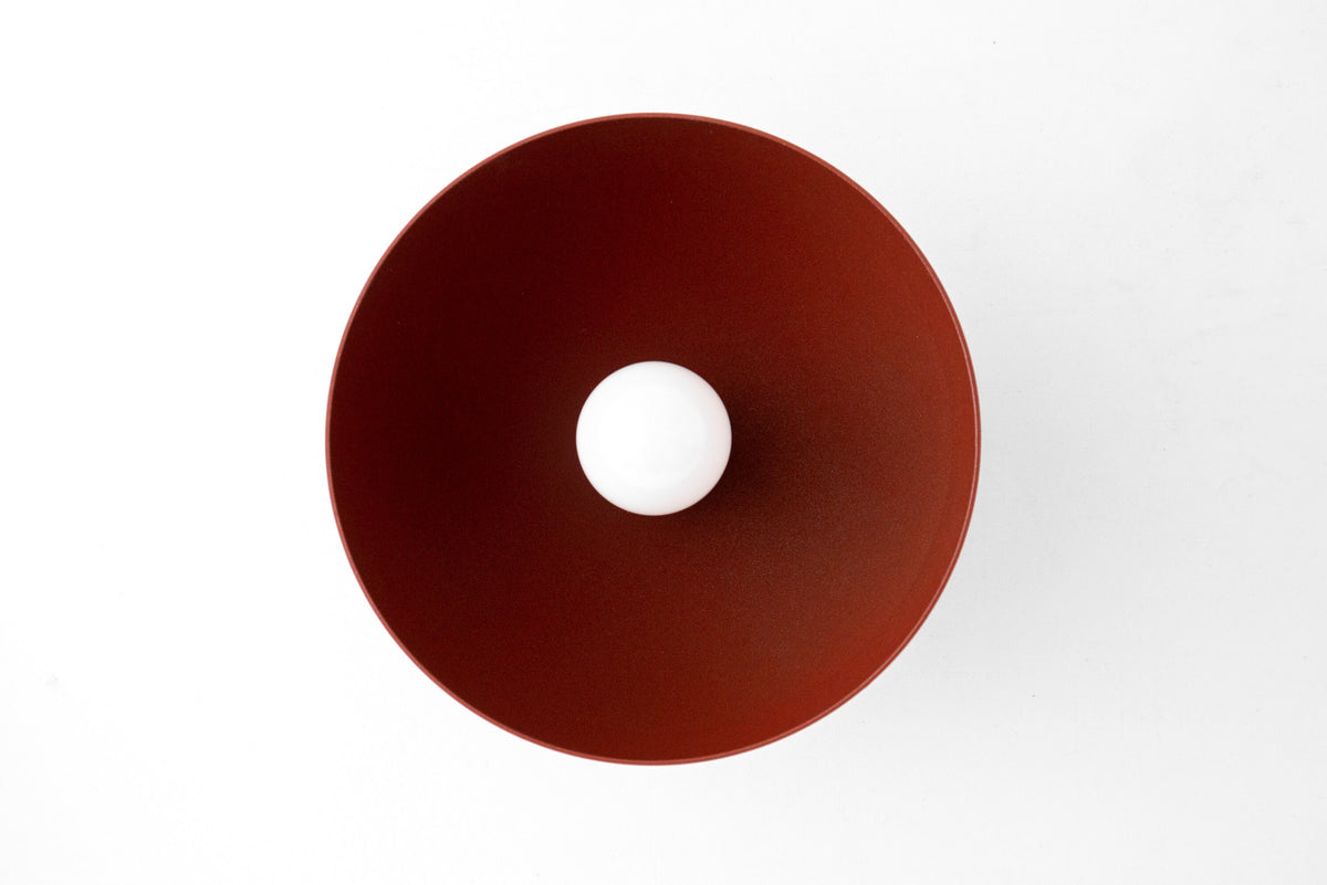 Brick red dome-shaped metal sconce with central bare bulb opening and matte finish. - SCONCE MODEL NO. 9105