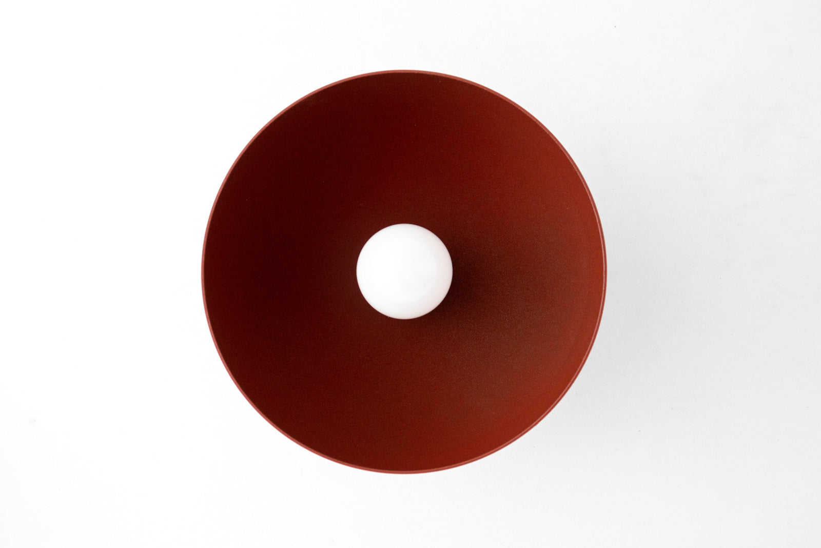 Brick red dome-shaped metal sconce with central bare bulb opening and matte finish. - SCONCE MODEL NO. 9105