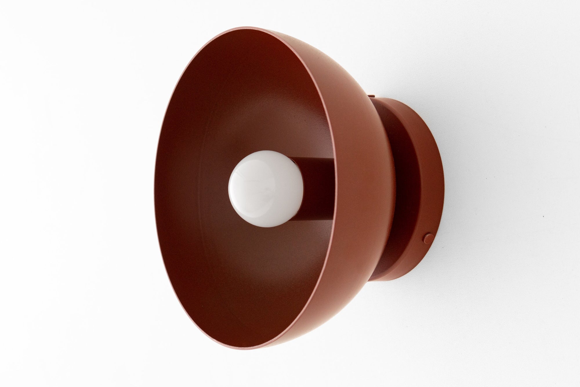 Brick red dome-shaped Scandinavian flush mount sconce with exposed bulb and matte finish. - SCONCE MODEL NO. 9105