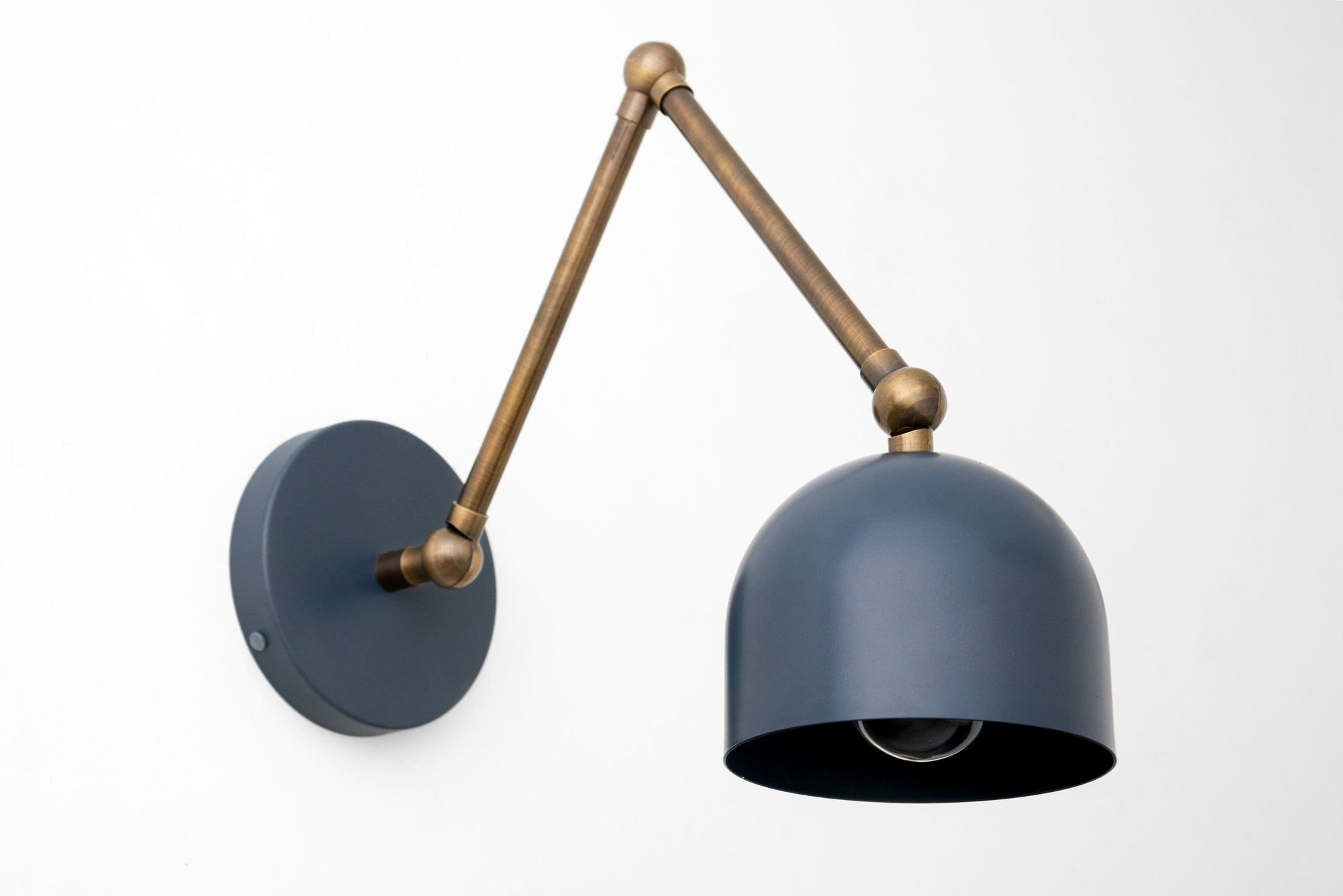 Adjustable industrial sconce with antique brass arm and matte coal blue dome shade. - SCONCE MODEL NO. 5998