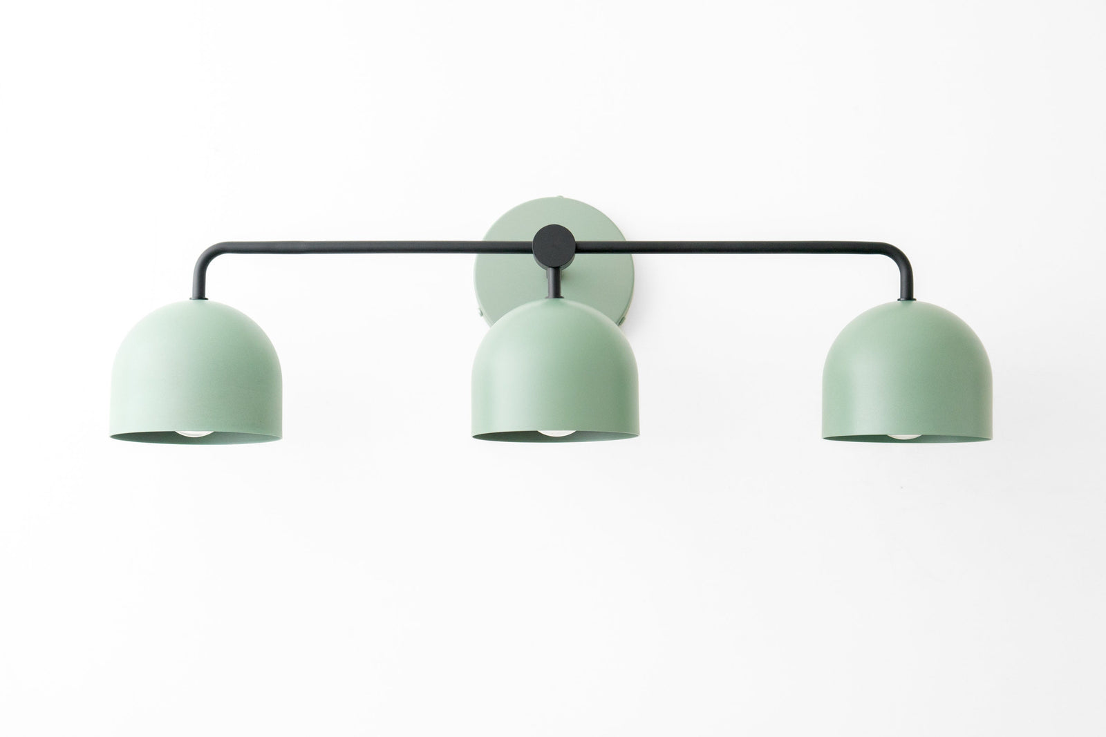Mid-century modern vanity light with three matte mint green shades and black metal frame. - VANITY LIGHT MODEL NO. 7456