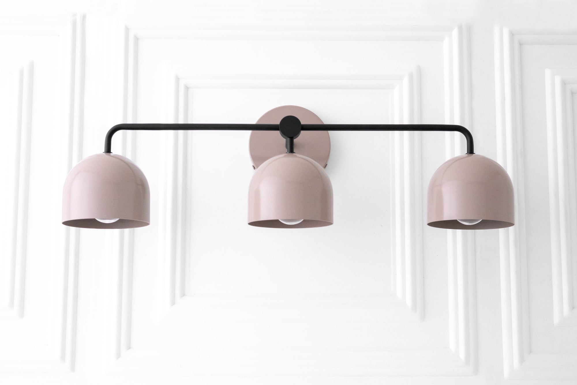 Mid-century modern 3-bulb vanity light in mauve with matte black horizontal bar and mounts. - VANITY LIGHT MODEL NO. 7456