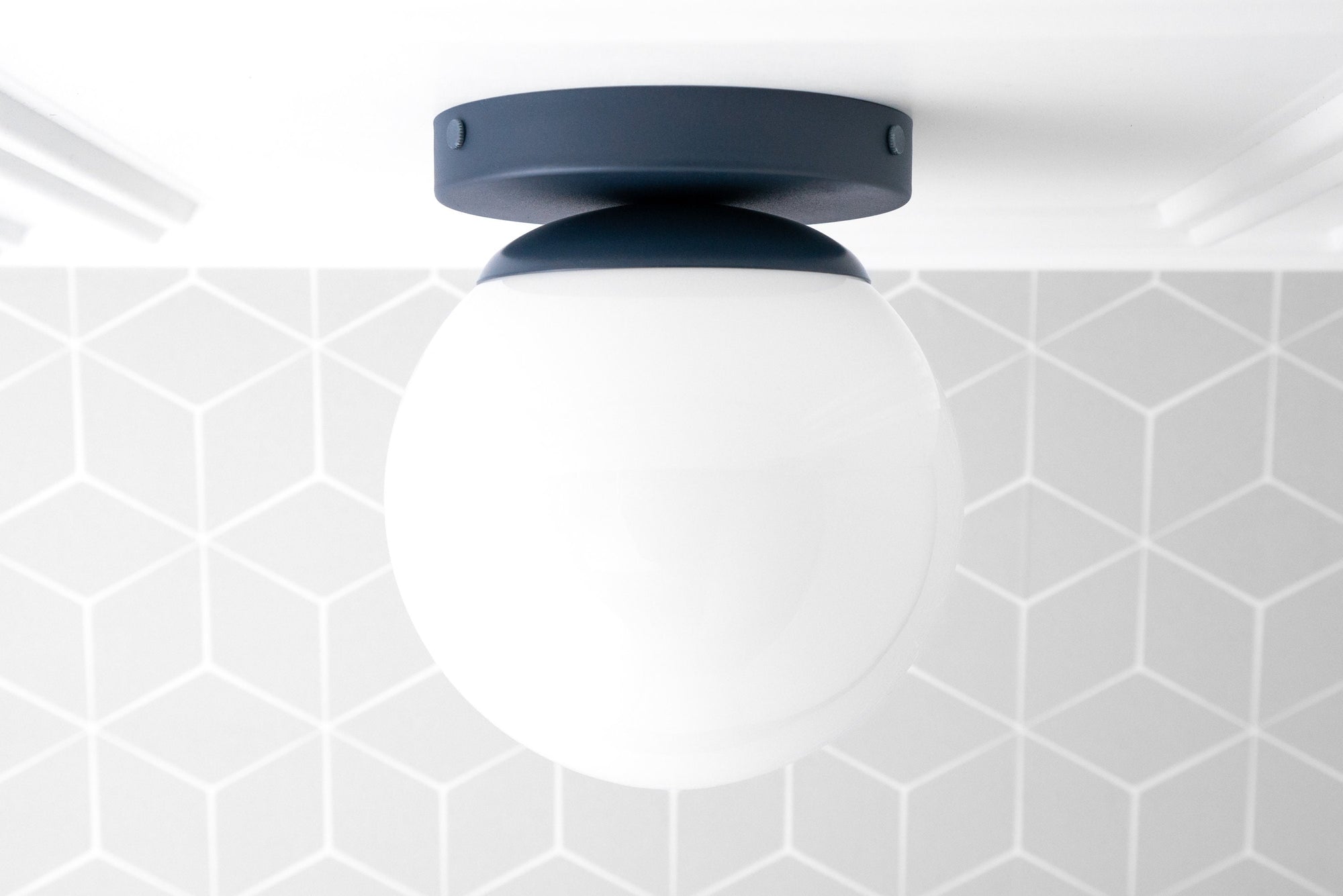 Flush mount ceiling light with a white globe and matte black base in a minimalist design. - CEILING LIGHT MODEL NO. 3825