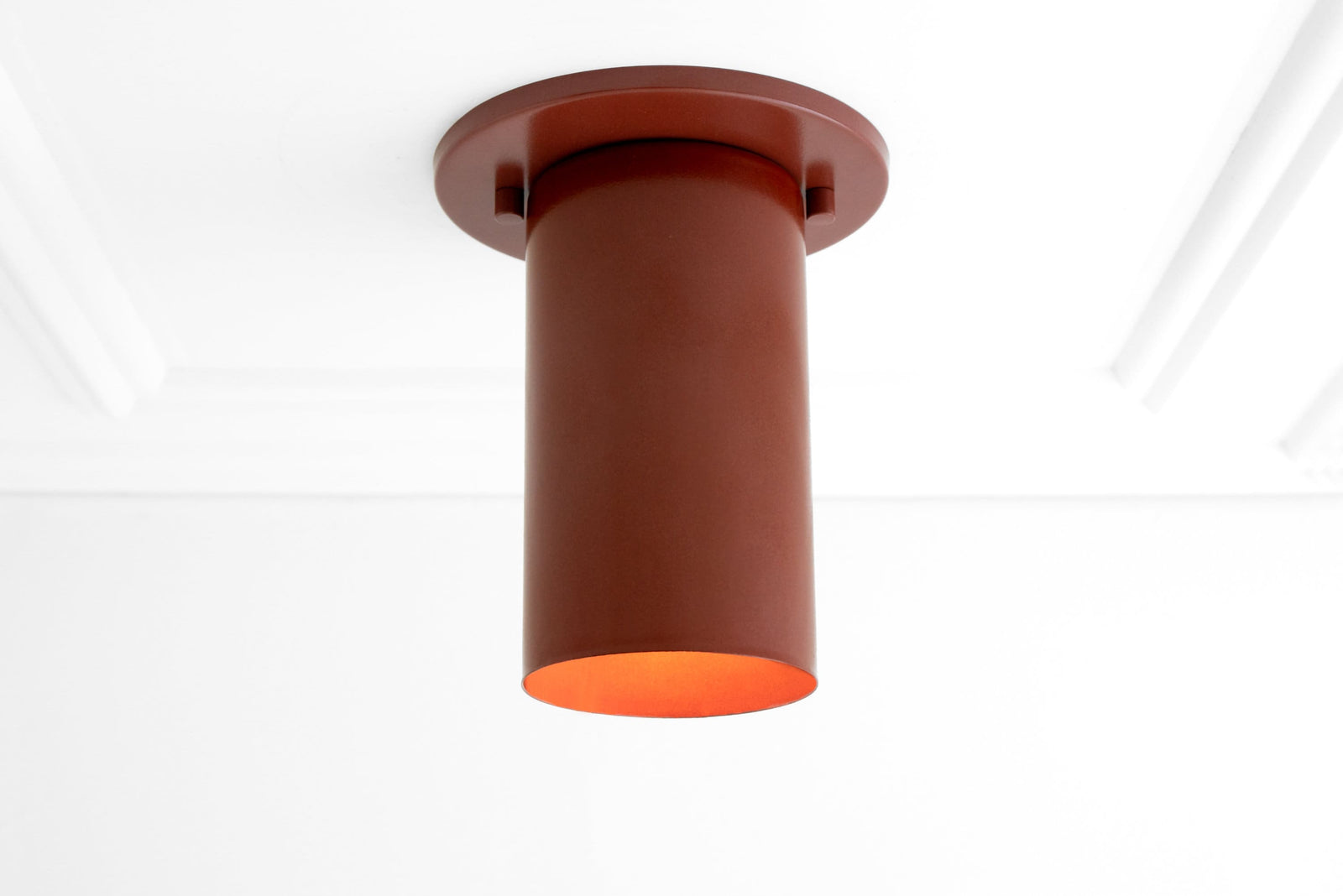 Mid-century modern flush mount ceiling light with cylindrical terracotta shade and warm inner glow. - CEILING LIGHT MODEL NO. 4771