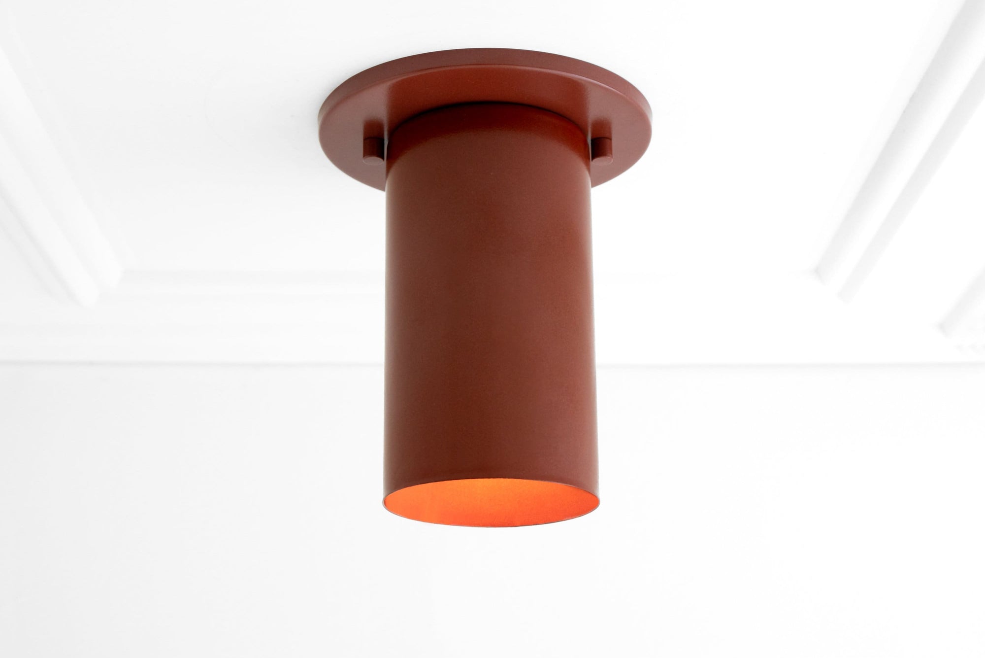 Mid-century modern flush mount ceiling light with cylindrical terracotta shade and warm inner glow. - CEILING LIGHT MODEL NO. 4771