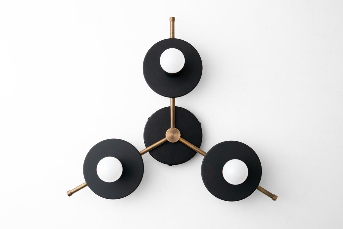 Mid-century modern chandelier with three black disk shades and antique brass arms, flush mount ceiling light. - CHANDELIER MODEL NO. 9526