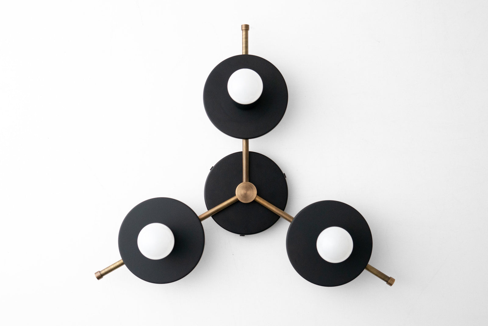 Mid-century modern chandelier with three black disk shades and antique brass arms, flush mount ceiling light. - CHANDELIER MODEL NO. 9526