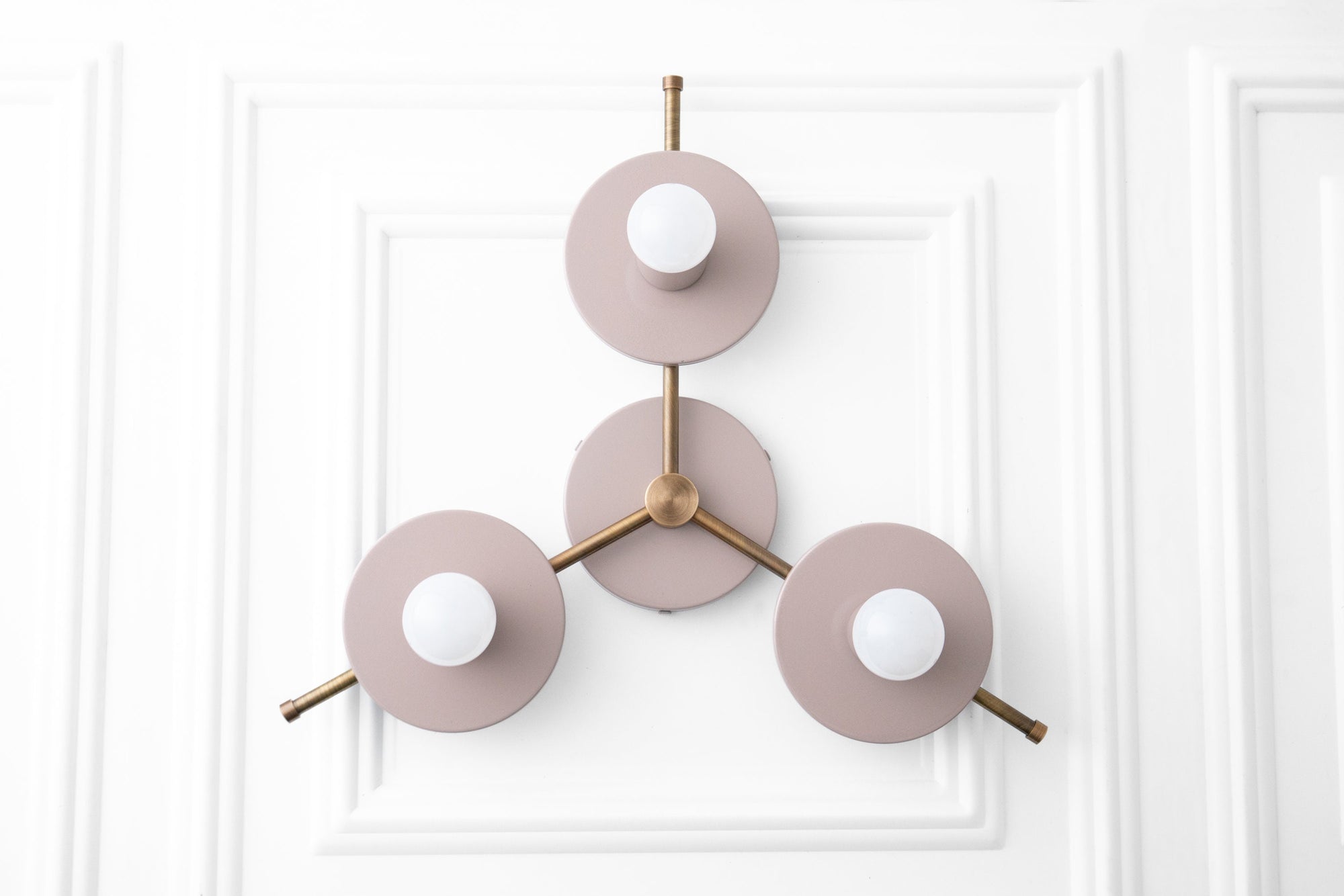 Mid-century modern chandelier with three mauve circular metal shades and antique brass accents. - CHANDELIER MODEL NO. 9526