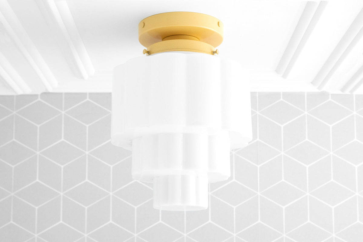 Art Deco white globe flush mount ceiling light with tiered cylindrical design and gold base. - CEILING LIGHT MODEL NO. 3602