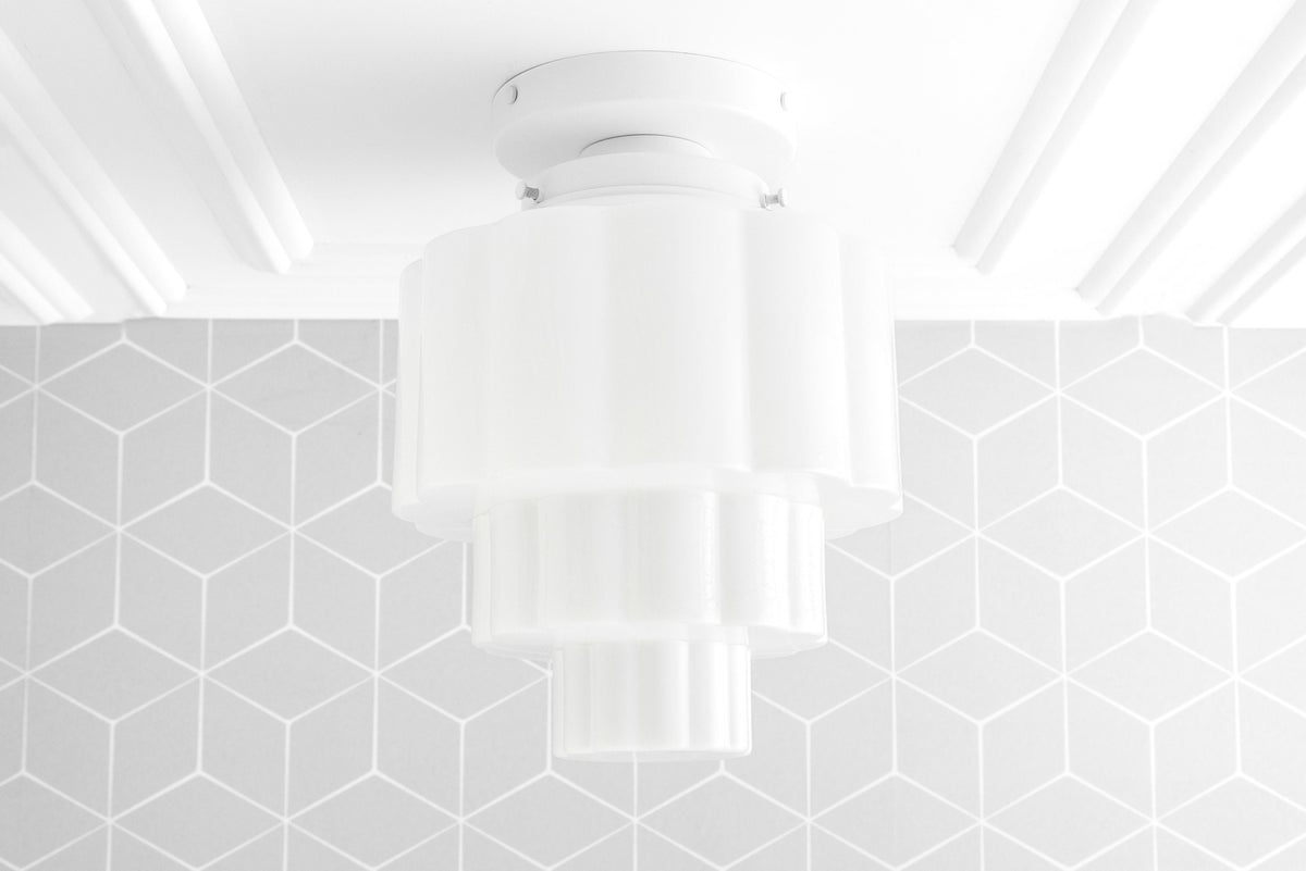 White Art Deco flush mount ceiling light with tiered globe design. - CEILING LIGHT MODEL NO. 3602