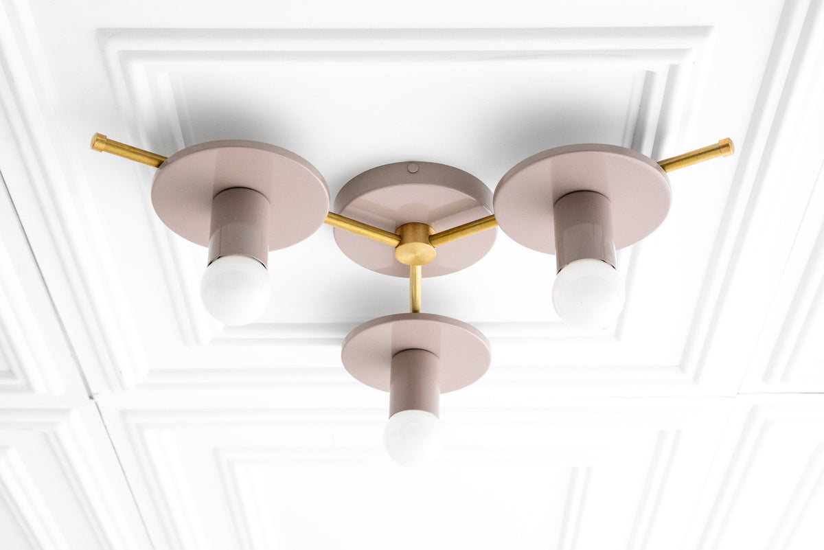 Mid-century modern flush mount chandelier with raw brass frame and mauve cylindrical shades. - CHANDELIER MODEL NO. 9526