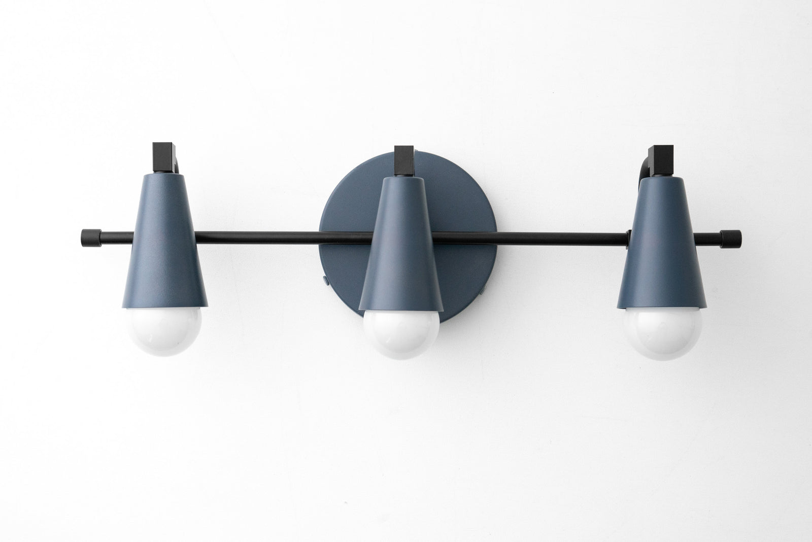 Mid-century modern 3-bulb vanity light with coal blue metal shades and black mounting bar. - VANITY LIGHT MODEL NO. 8084
