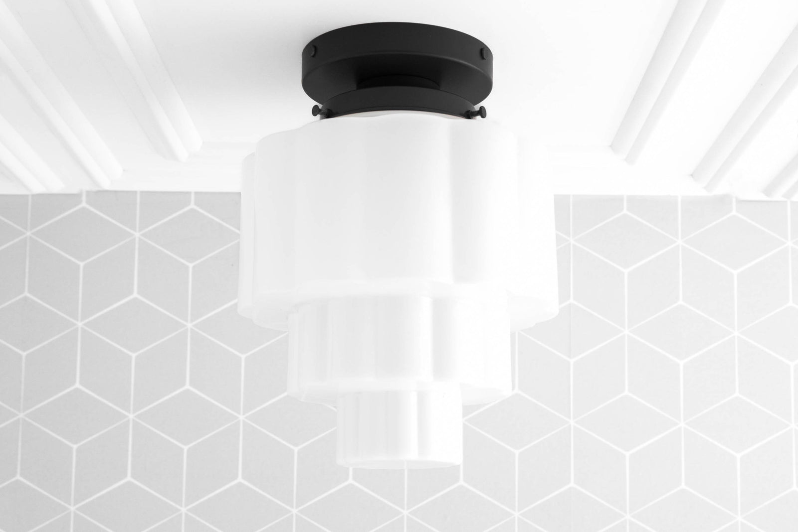 Art Deco flush mount ceiling light with layered white glass globes and black base. - CEILING LIGHT MODEL NO. 3602