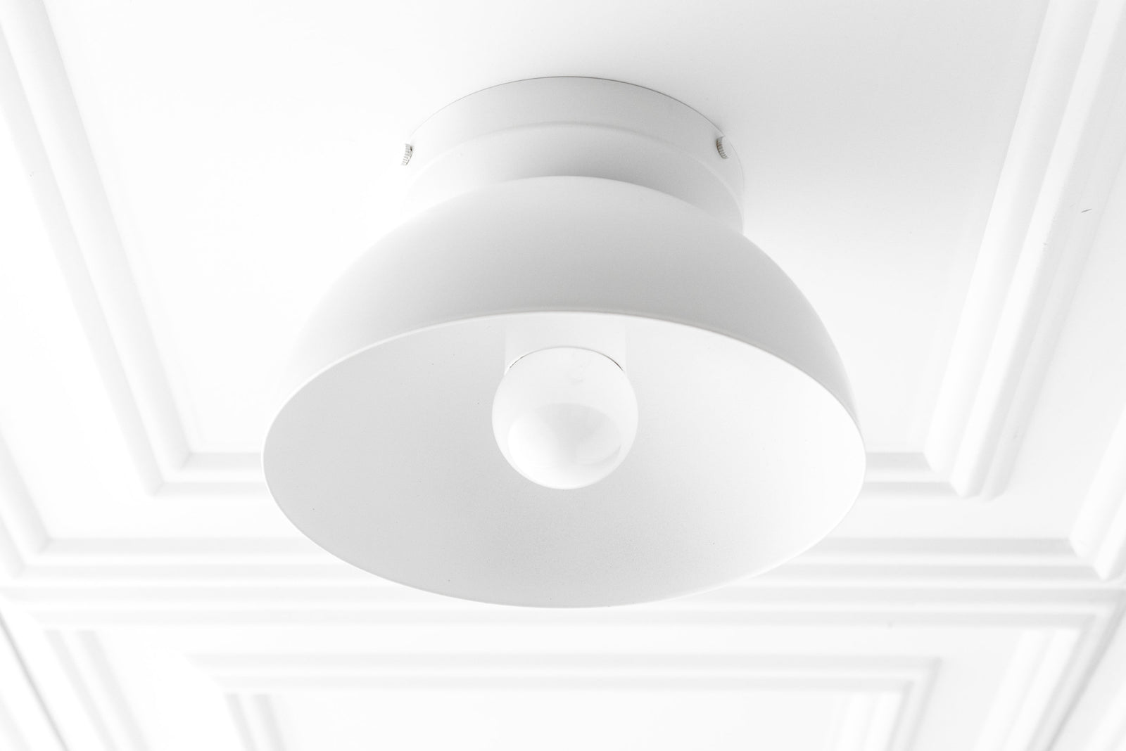 Matte white dome-shaped flush mount ceiling light with exposed bulb and smooth finish. - CEILING LIGHT MODEL NO. 9105