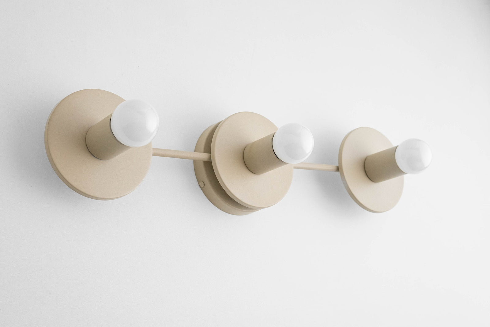 Matte cream three-bulb vanity light with exposed round bulbs and minimalist Scandinavian design. - VANITY LIGHT MODEL NO. 5708