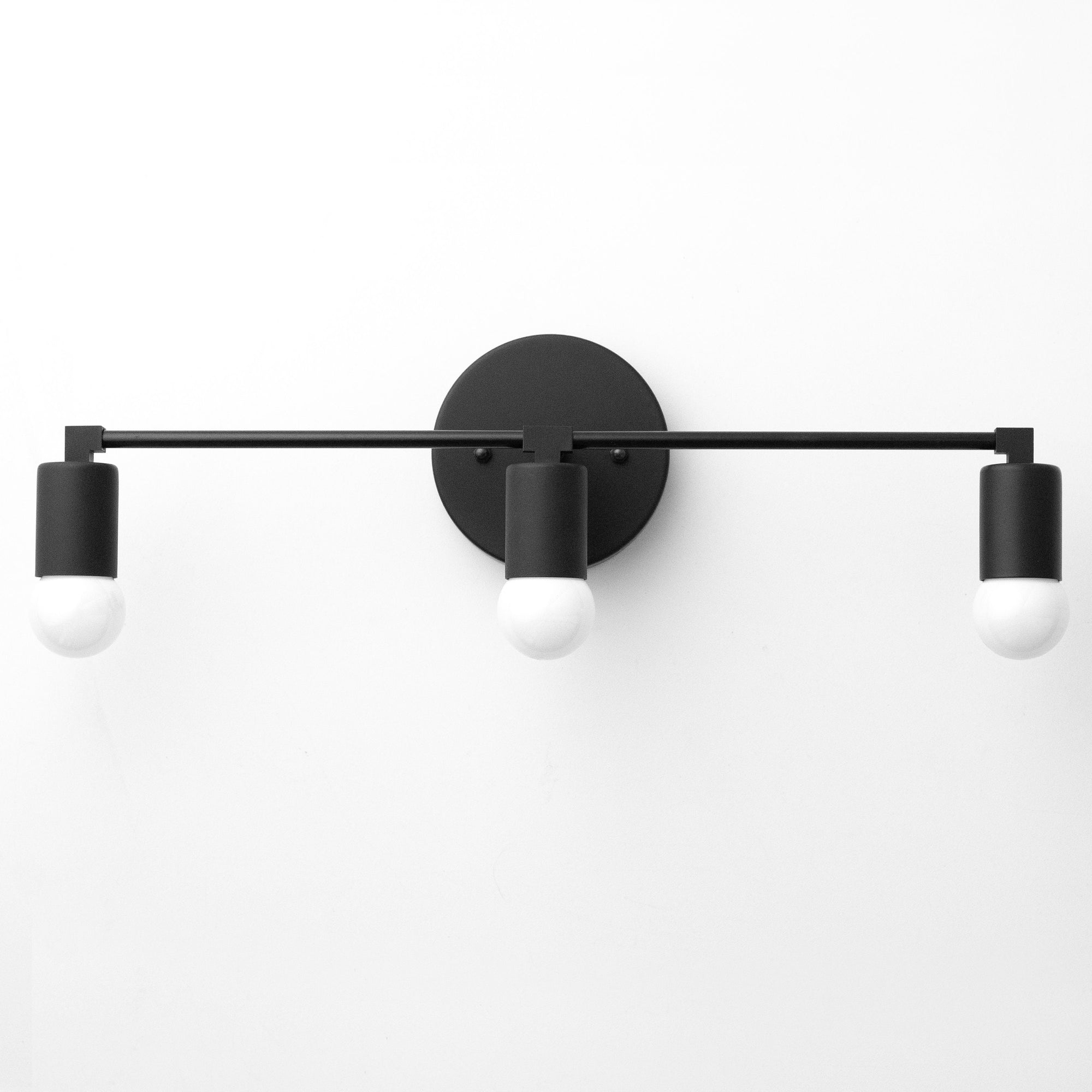 thumbnail image 2 of XiNBEI Black Bathroom Vanity Light - 3 Light Modern Wall Fixture With White Glass Shades 2 of 14