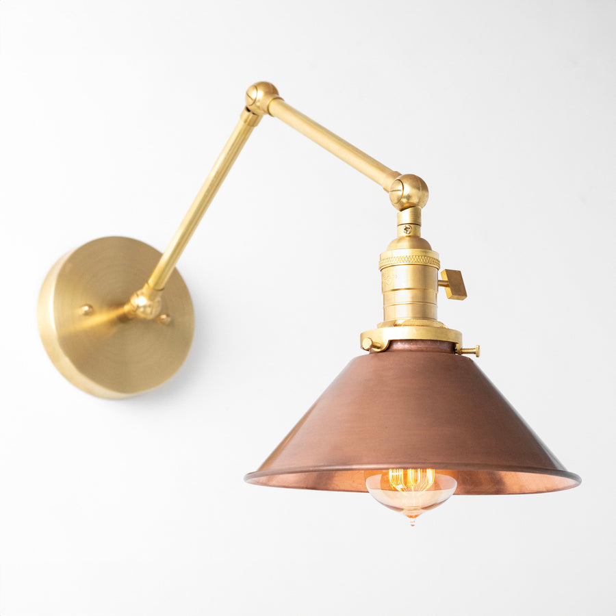 Adjustable industrial wall sconce with raw brass arm and brown conical metal shade. - SCONCE MODEL NO. 6668