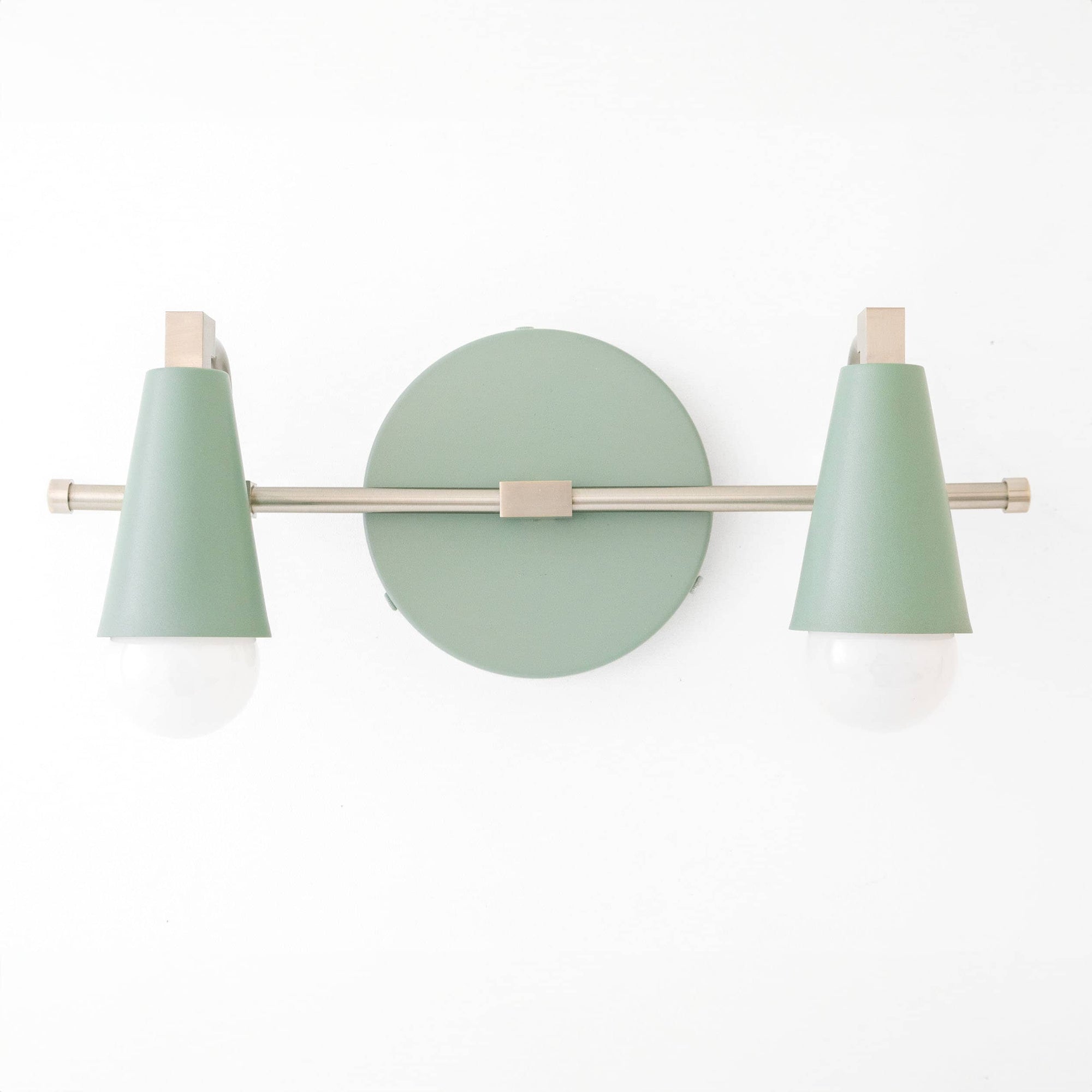 Brushed nickel vanity light with two green cone shades and exposed bulbs, Scandinavian style. - VANITY LIGHT MODEL NO. 1229