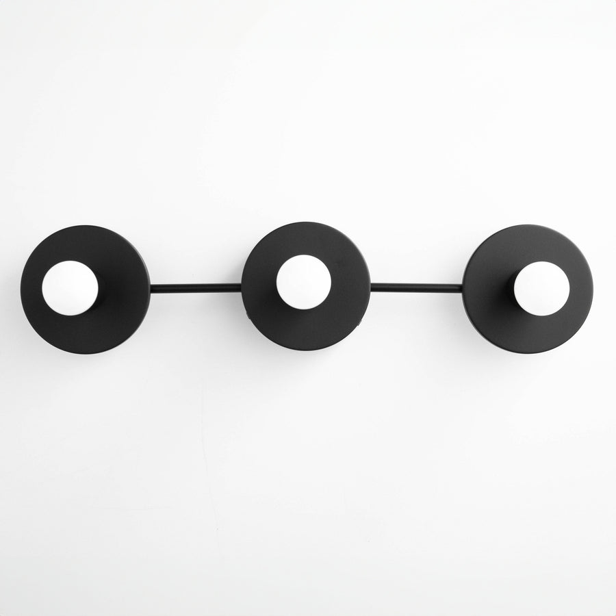 Black Scandinavian-style vanity light fixture with three circular mounts and exposed bulbs. - VANITY LIGHT MODEL NO. 5708