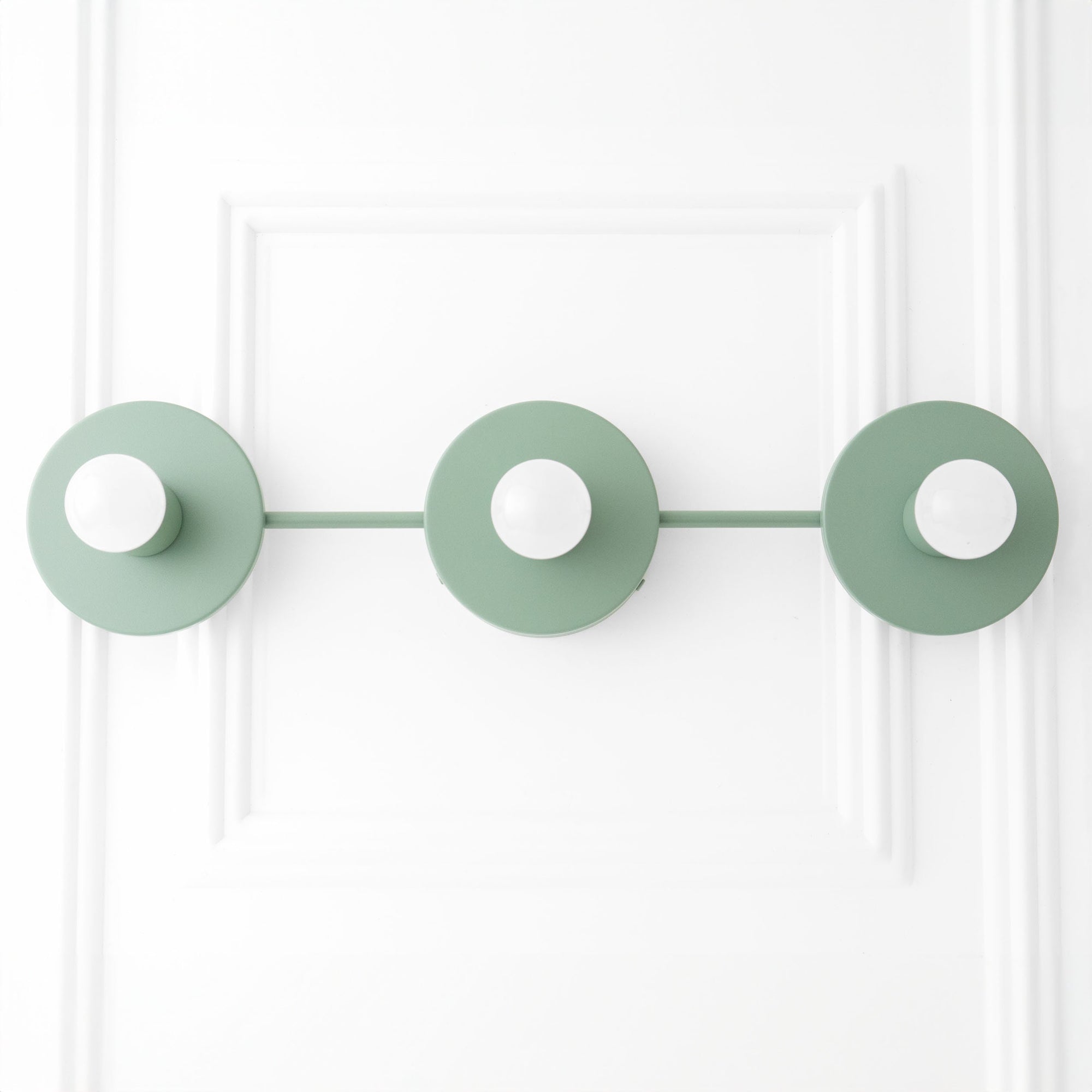 Mid-century modern 3-bulb green vanity light with circular metal shades and exposed bulbs. - VANITY LIGHT MODEL NO. 5708