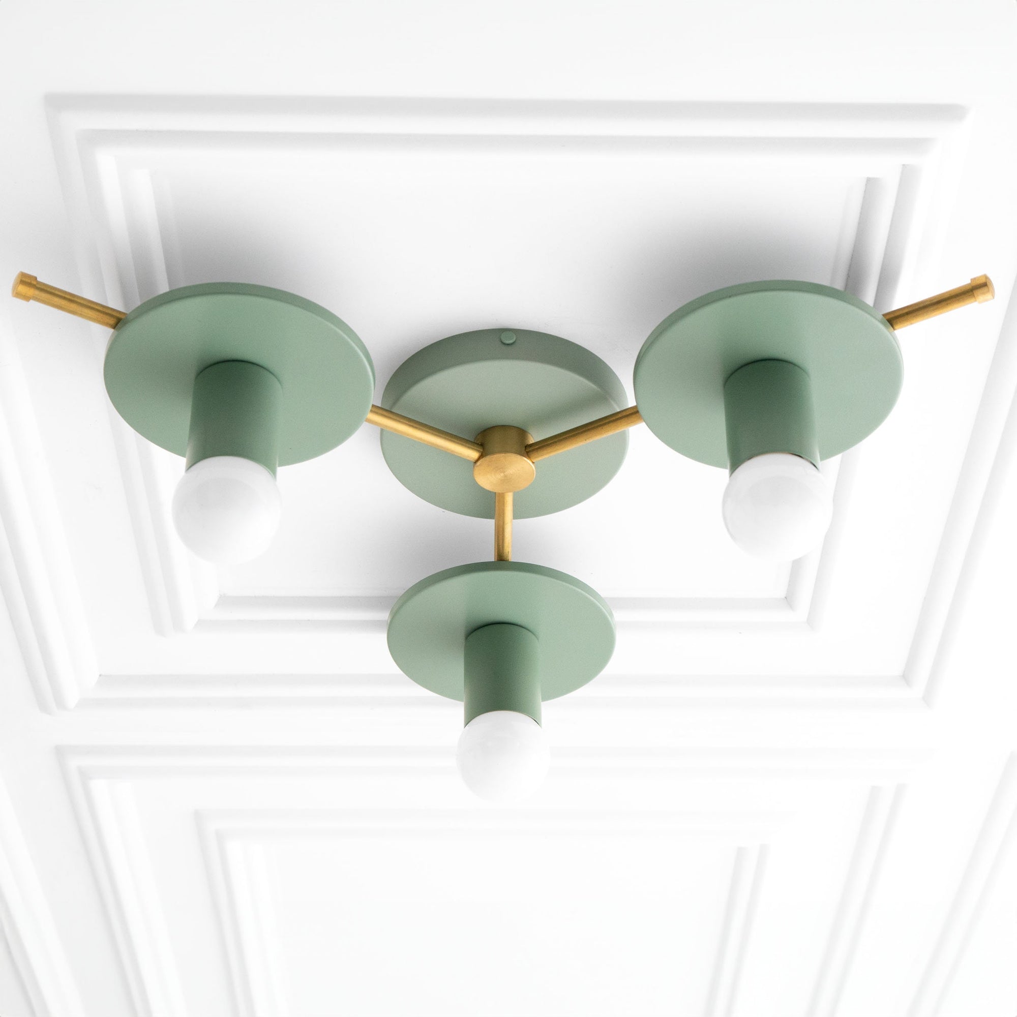 Mid-century modern chandelier with three green matte shades and raw brass accents, mounted flush ceiling light. - CHANDELIER MODEL NO. 9526