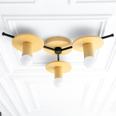 Mid-century modern flush mount chandelier in matte yellow with three exposed bulbs and black metal accents. - CHANDELIER MODEL NO. 9526