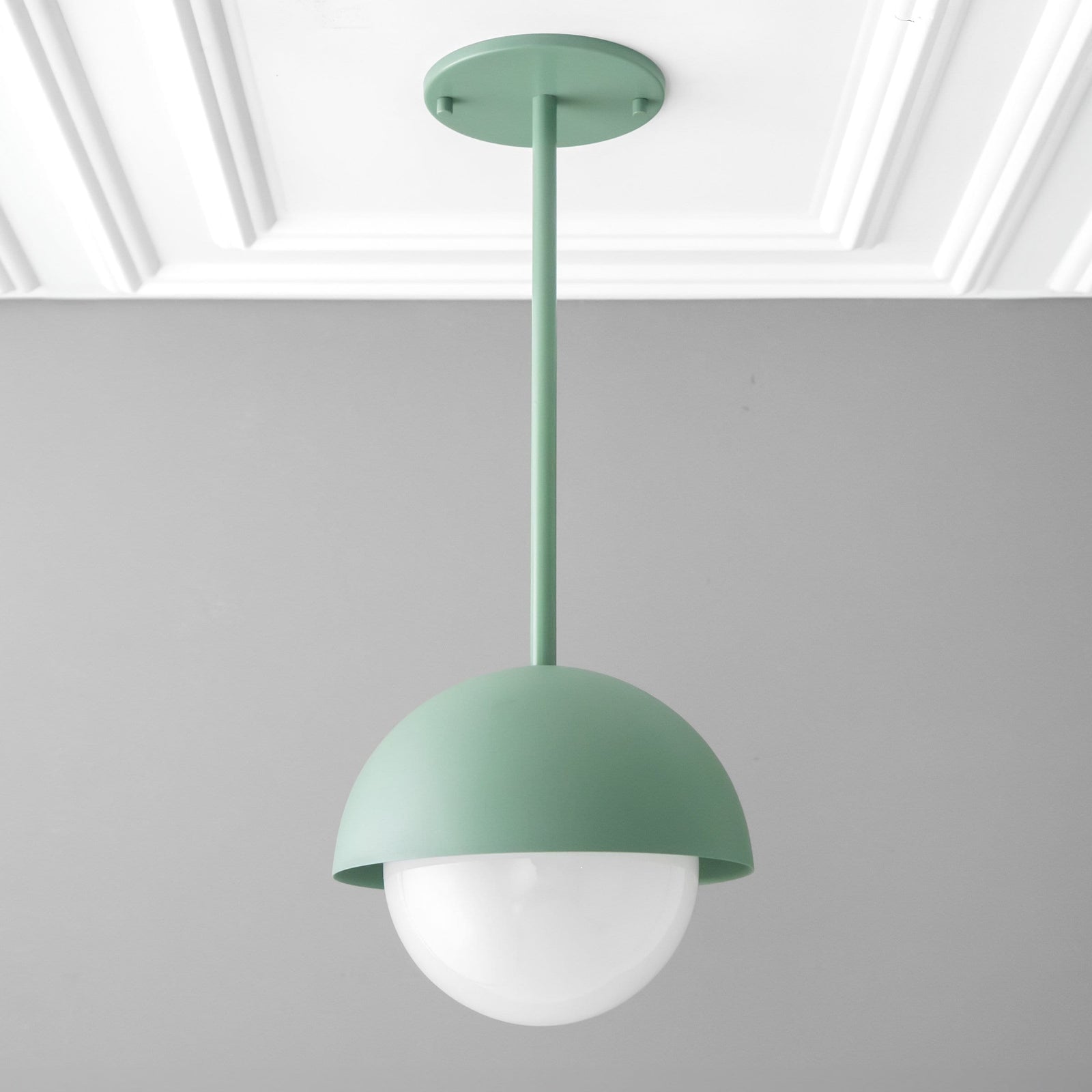 Green dome pendant light with white globe shade and minimalist Scandinavian design. - PENDANT MODEL NO. 6357