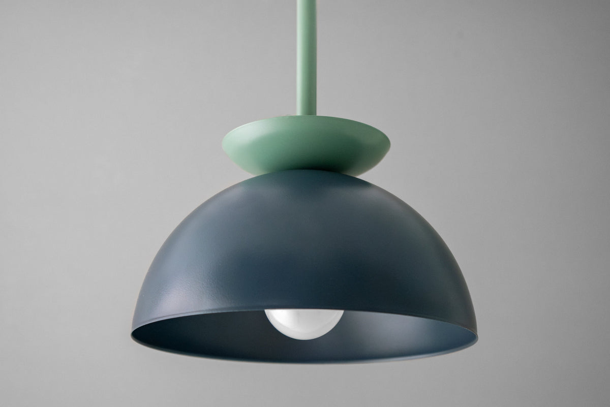 Scandinavian-style pendant light with a matte green dome shade and a smaller green disc above. - PENDANT MODEL NO. 4975