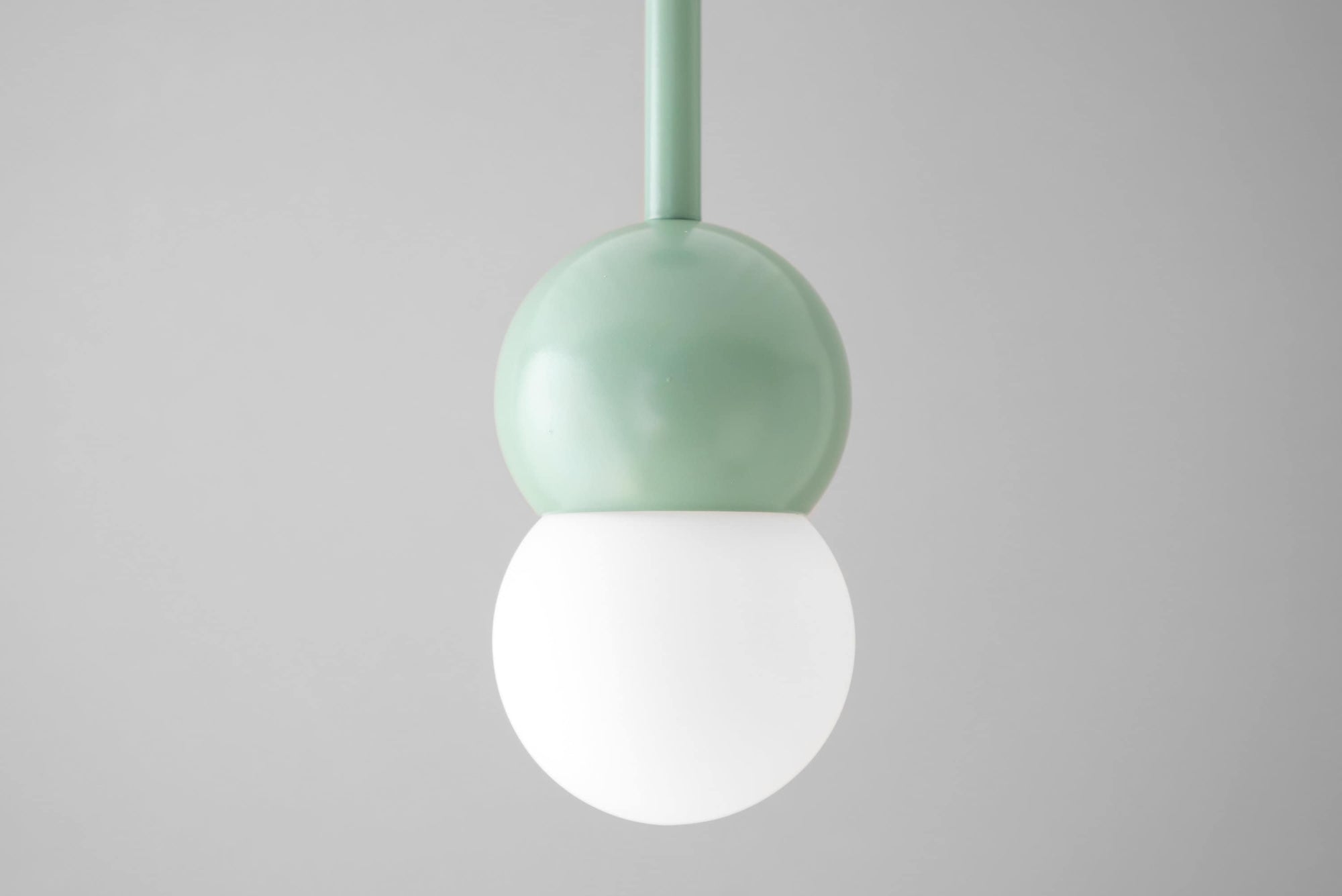 Green matte globe pendant light with frosted white round glass shade in Scandinavian style. - PENDANT MODEL NO. 6129