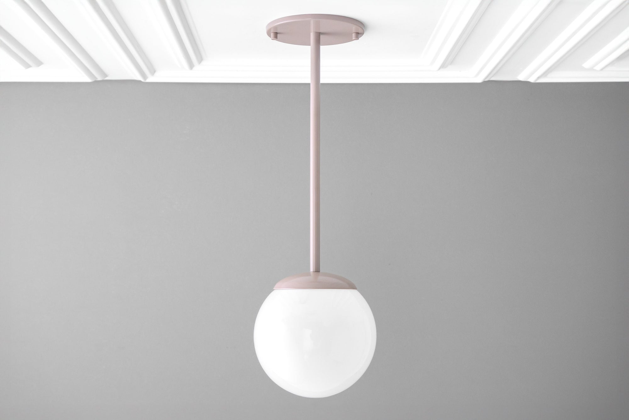 Mid-century modern pendant light with matte brick red metal fixture and frosted white globe shade. - PENDANT MODEL NO. 7559