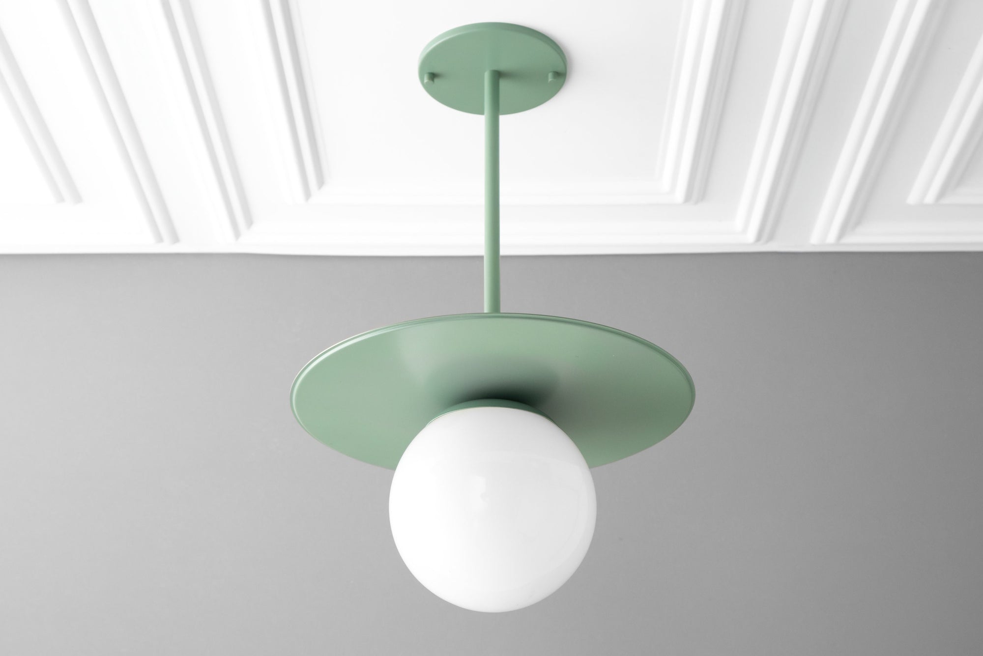 Scandinavian pendant light with matte green metal shade and white glass globe diffuser. - PENDANT MODEL NO. 8548