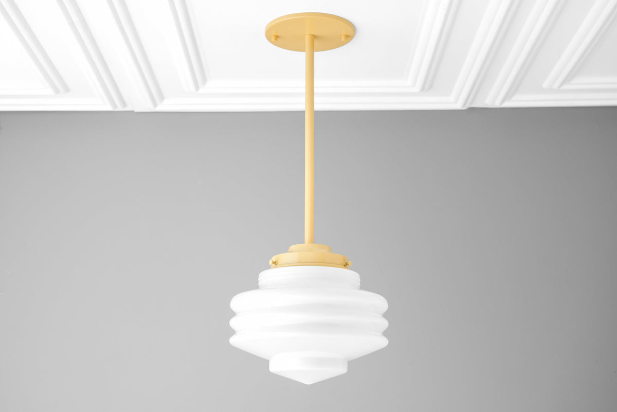 Art Deco style white globe pendant light with tiered geometric design and matte gold ceiling mount. - PENDANT MODEL NO. 6388