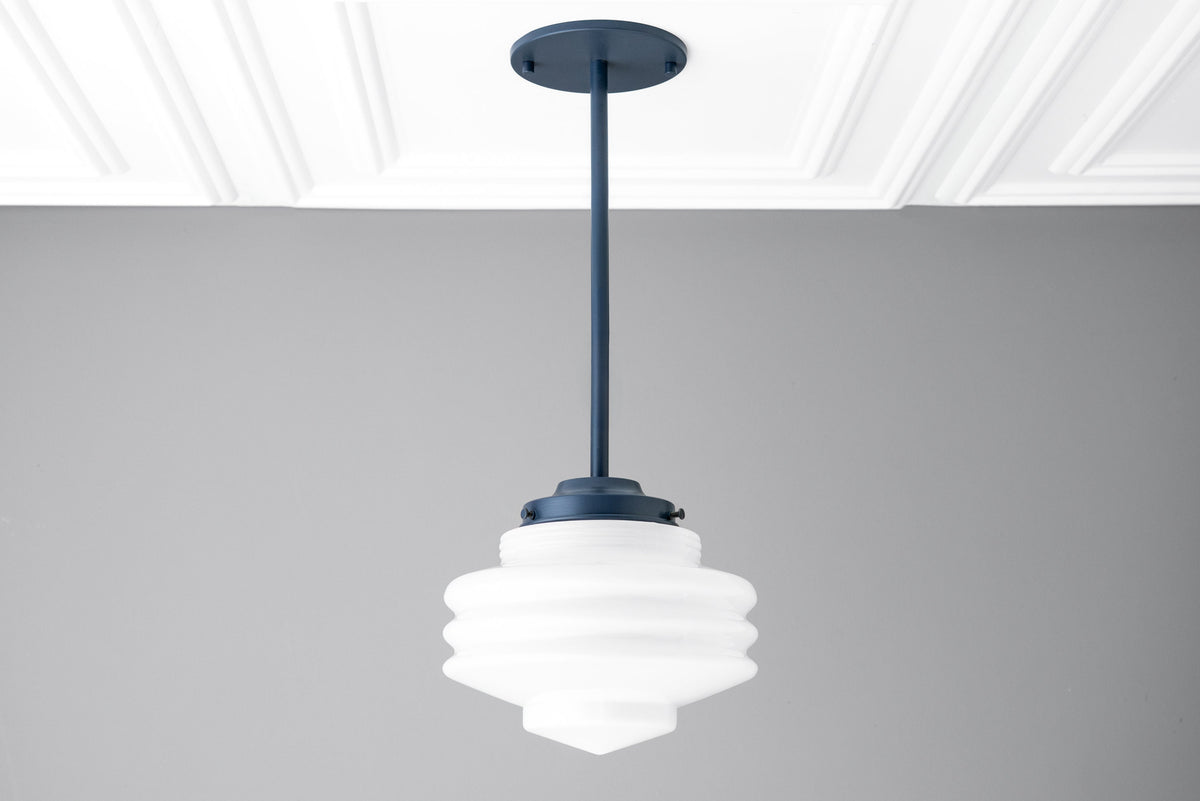 Art Deco white globe pendant light with layered glass design and navy blue mount. - PENDANT MODEL NO. 6388