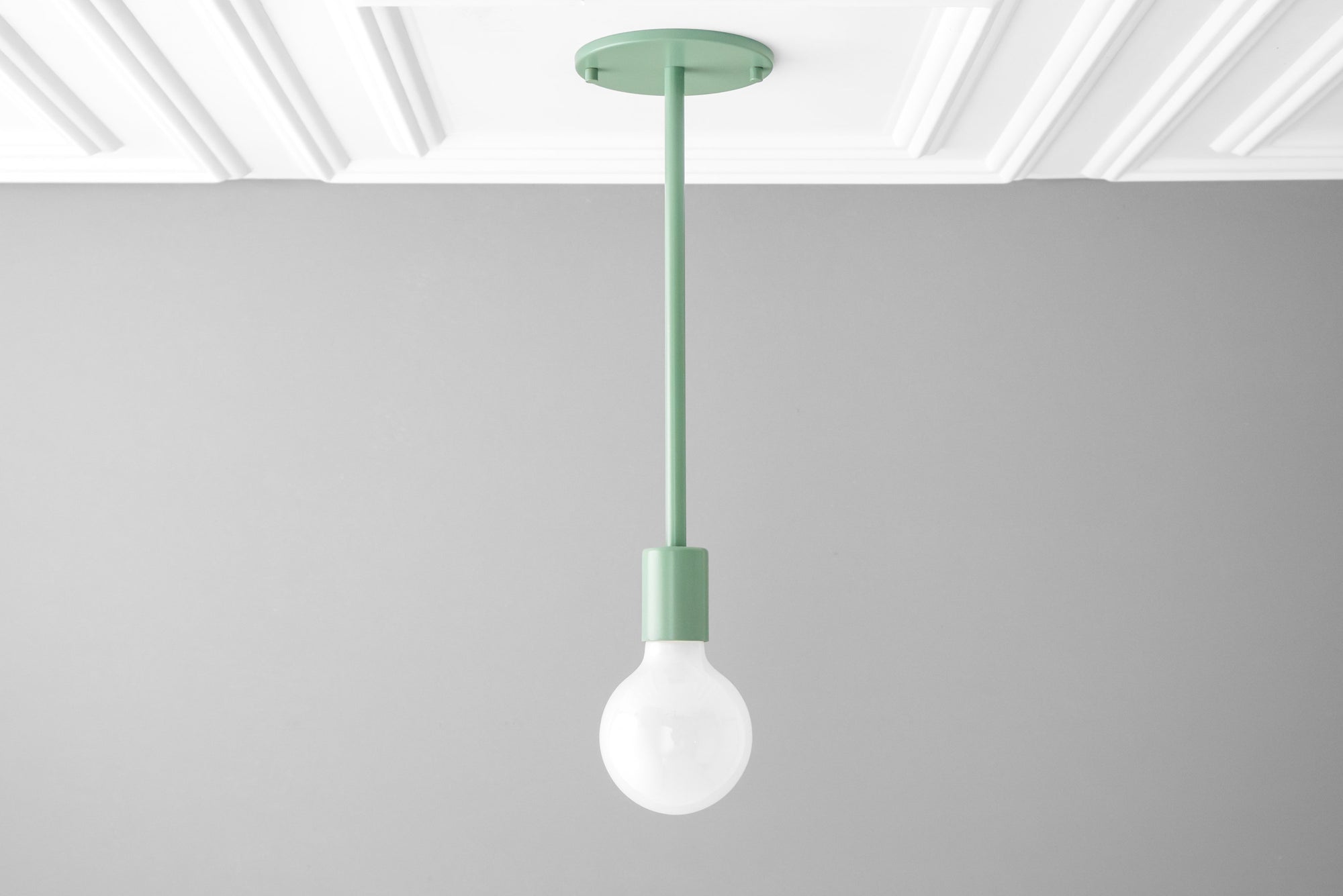 Scandinavian style bare bulb pendant light with matte green metal fixture and ceiling mount. - PENDANT MODEL NO. 6558