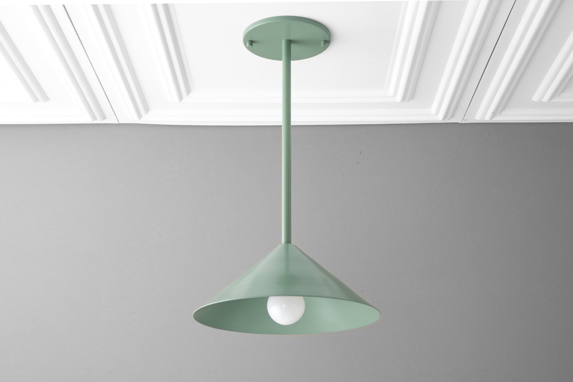 Scandinavian mid-century modern pendant light with matte green conical shade and white bulb. - PENDANT MODEL NO. 6757