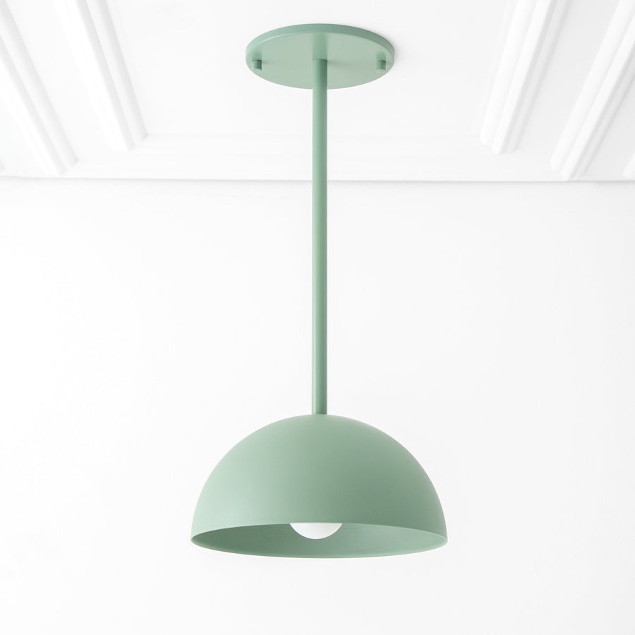 Matte green dome pendant light with minimalist Scandinavian design and slim suspension rod. - PENDANT MODEL NO. 9770