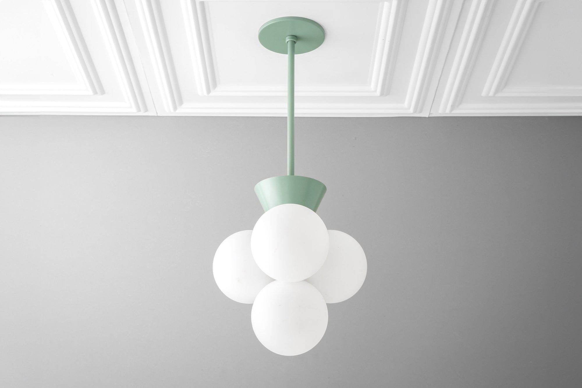 Green minimalist chandelier with six frosted globe lights and matching ceiling mount. - CHANDELIER MODEL NO. 9834