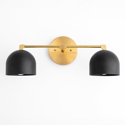 Mid-century modern vanity light with two matte black dome shades and a round antique brass wall mount. - VANITY LIGHT MODEL NO. 0698