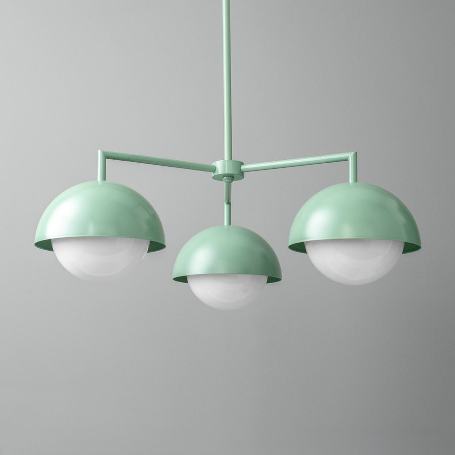 Scandinavian style chandelier with three green metal dome shades and white globe lights. - CHANDELIER MODEL NO. 9420