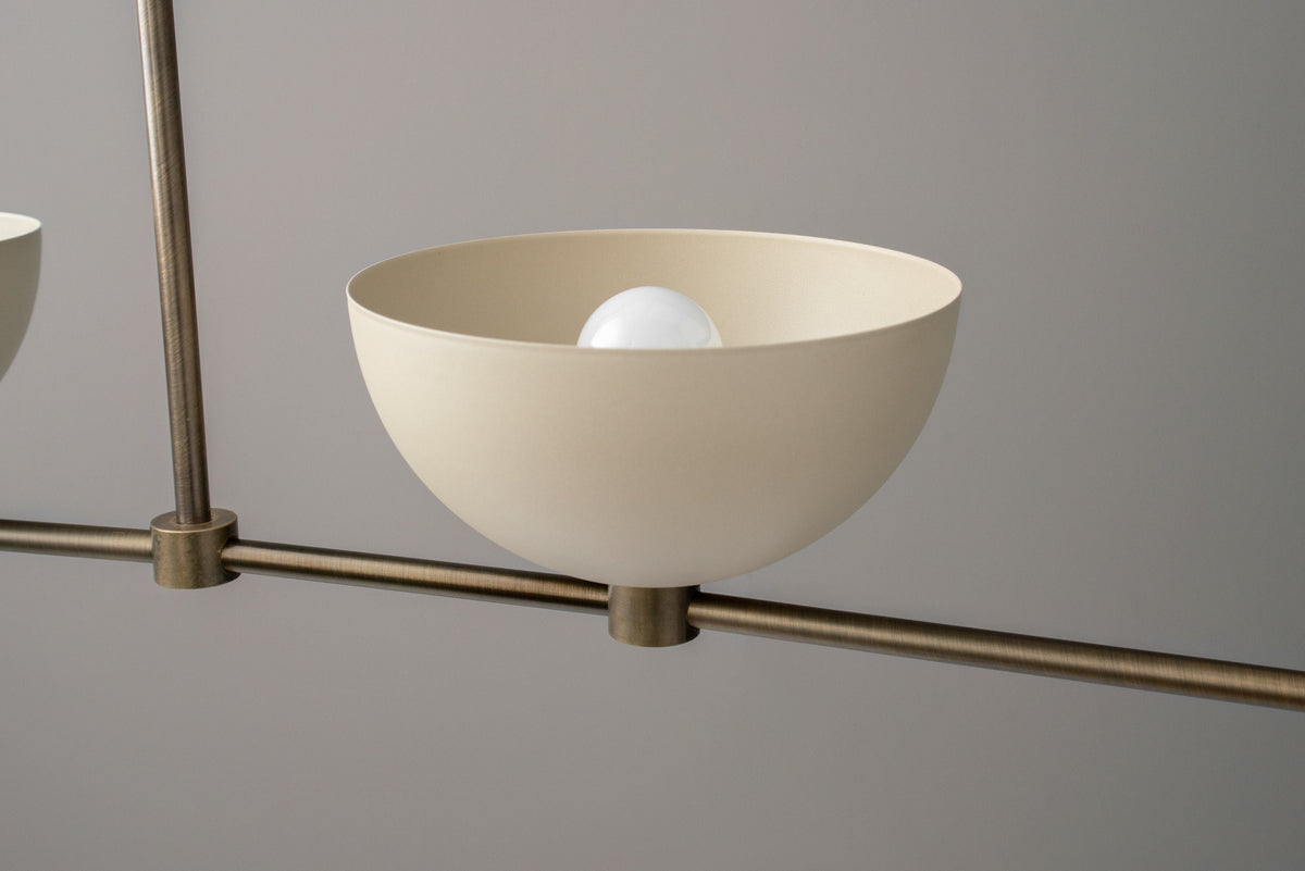 Antique brass chandelier with cream dome-shaped shade and exposed bulb, part of Dome Series. - CHANDELIER MODEL NO. 4577