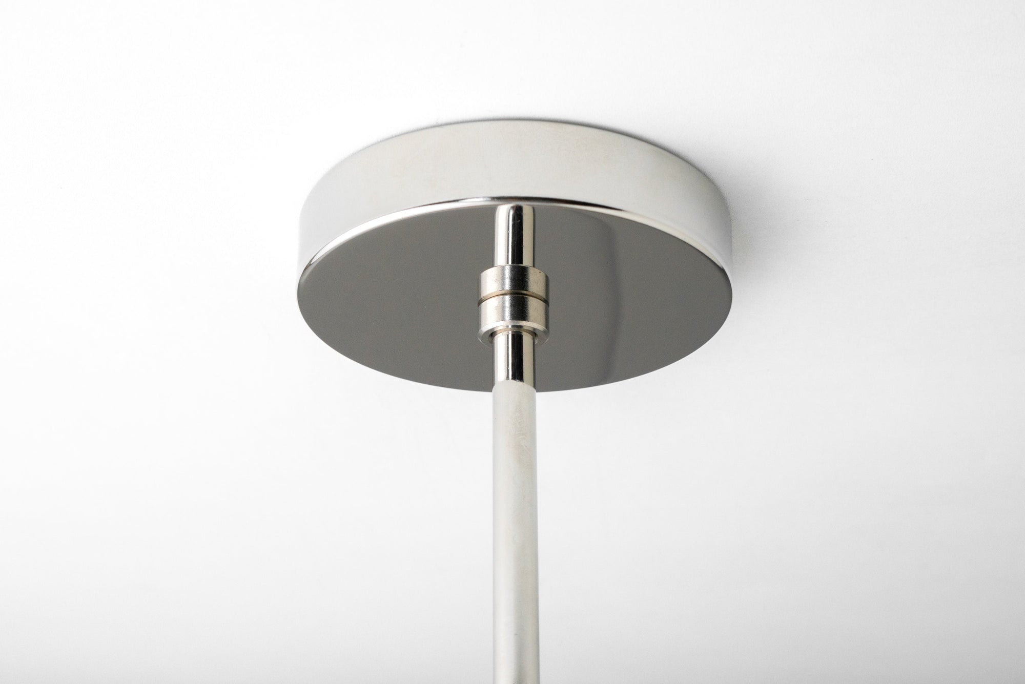 Polished nickel ceiling mount plate with sleek cylindrical rod chandelier attachment. - CHANDELIER MODEL NO. 1192