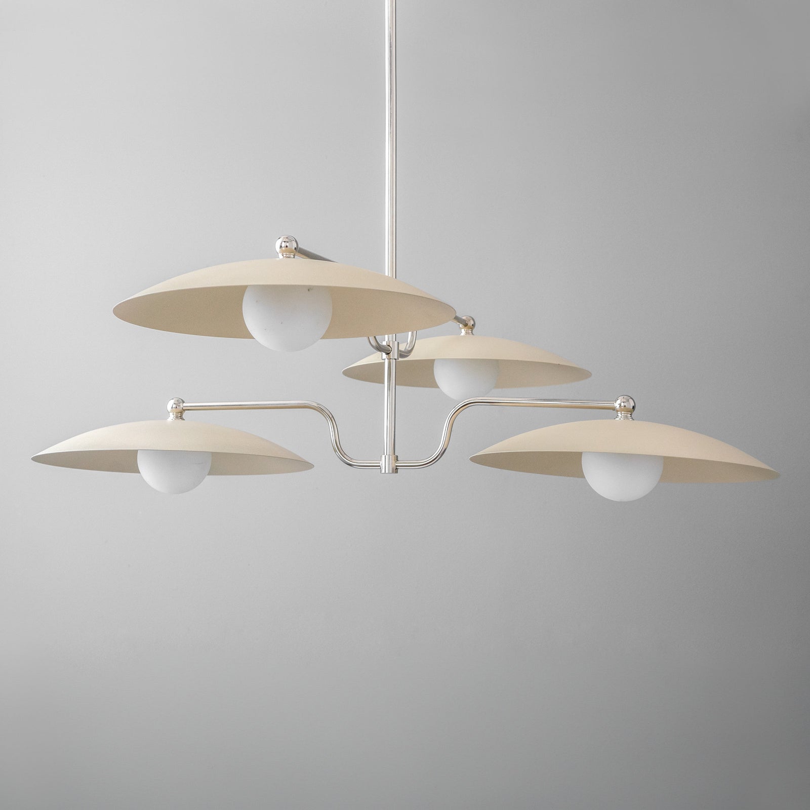Mid-century modern chandelier with three cream-colored disc shades and polished nickel arms. - CHANDELIER MODEL NO. 1192