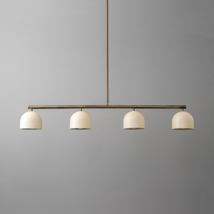 Linear chandelier with four matte white globe shades and antique brass finish rod. - CHANDELIER MODEL NO. 7998