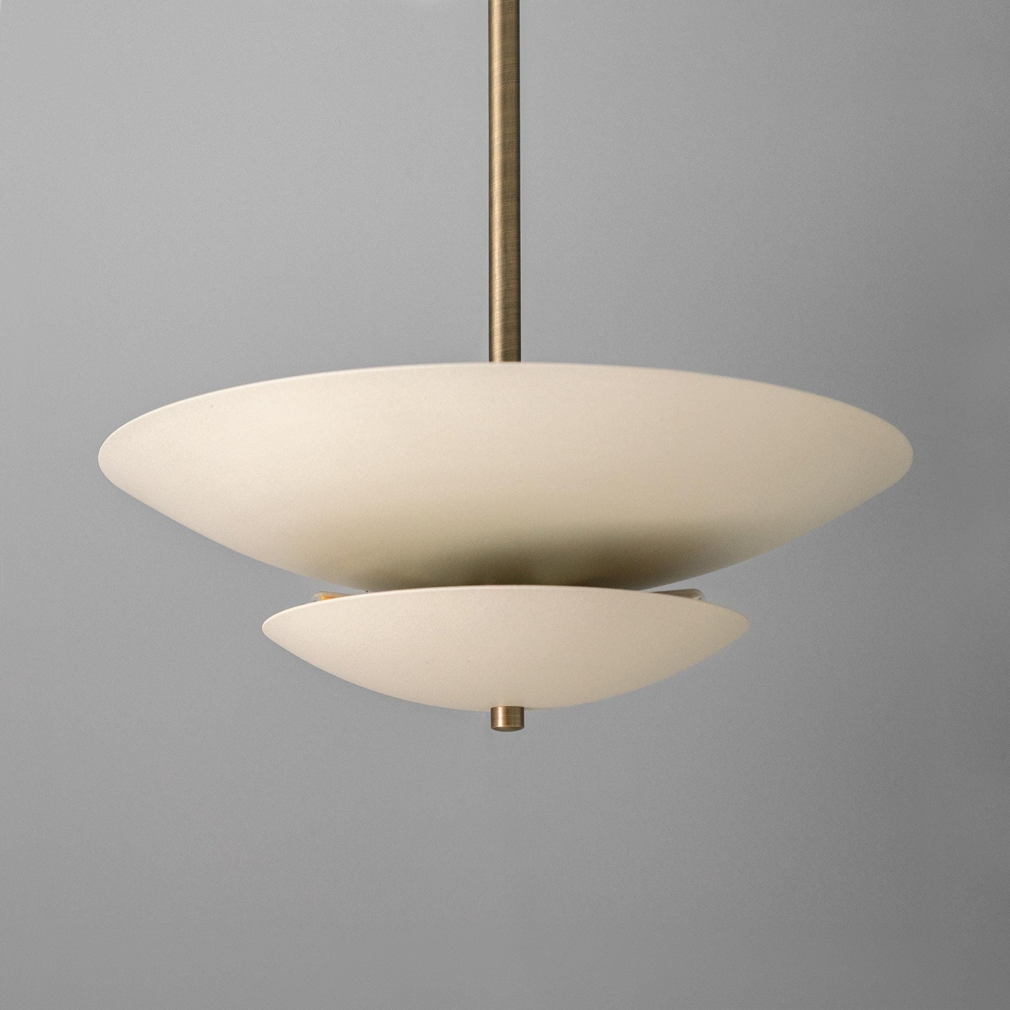Mid-century modern chandelier with two layered cream disc shades and antique brass rod suspension. - CHANDELIER MODEL NO. 3434