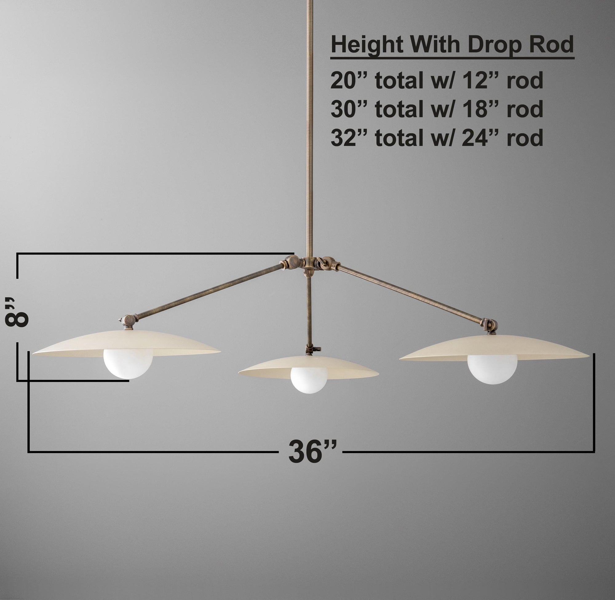 Minimalist antique brass chandelier with three flat disc-shaped white shades, measuring 36 inches wide and 8 inches high. - CHANDELIER  MODEL NO. 7014