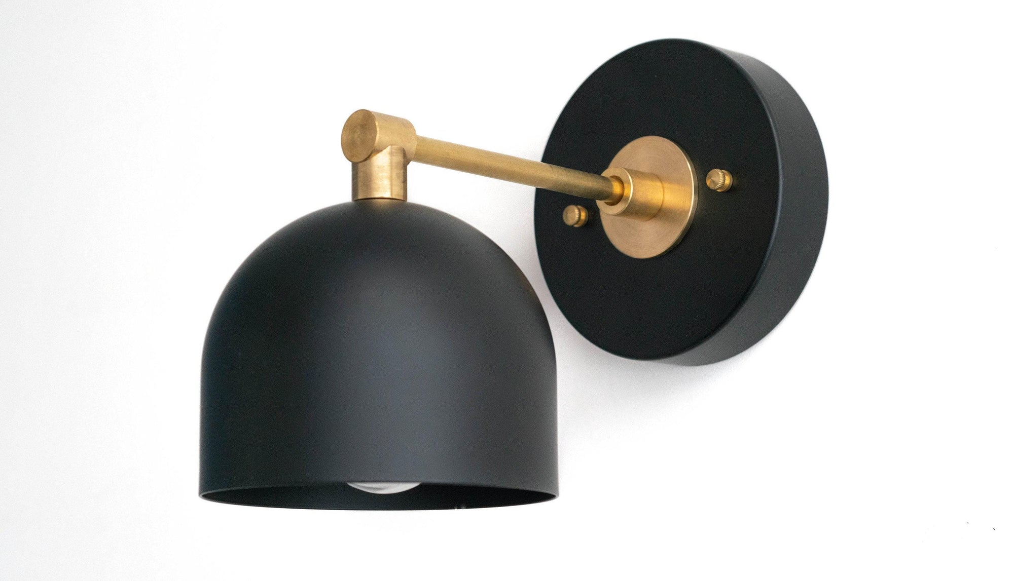 Black matte dome sconce with brass arm and round wall mount, Scandinavian style lighting fixture. - SCONCE MODEL NO. 3242
